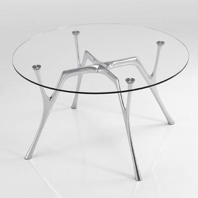 Tavolo circolare Pegaso con struttura alluminio lucidato piano vetro trasparente