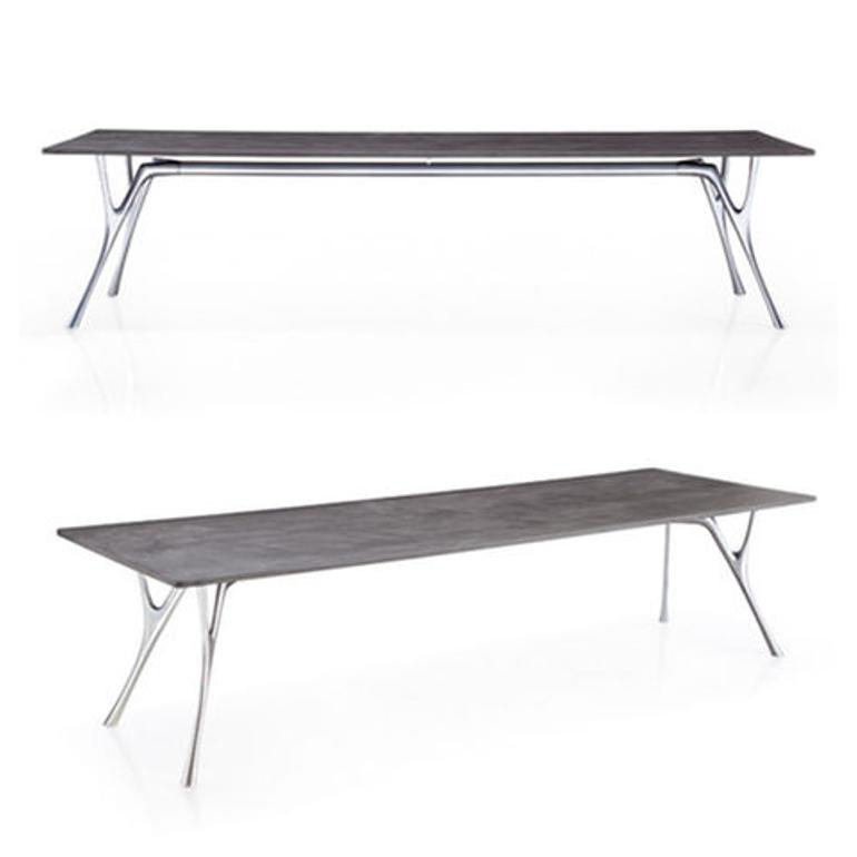 Tavolo rettangolare Pegaso struttura in alluminio lucidato piano cemento